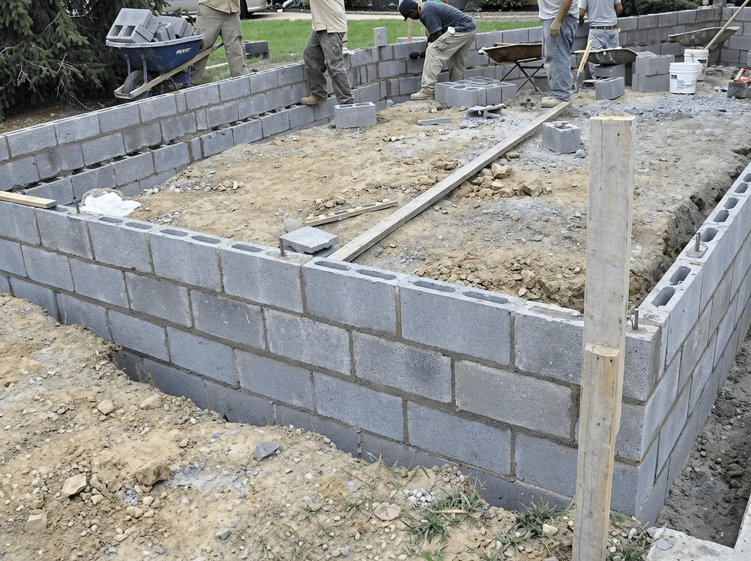Professionals building a foundation with blocks in Nashville, TN